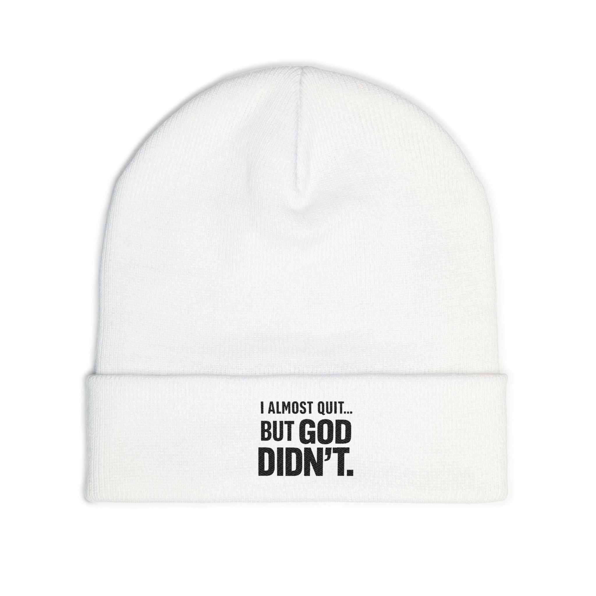 Christian faith beanie hat worn outdoors — faith over giving up